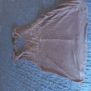 Cute backless rue21 shirt grey and White size medium criss-crossed in the back